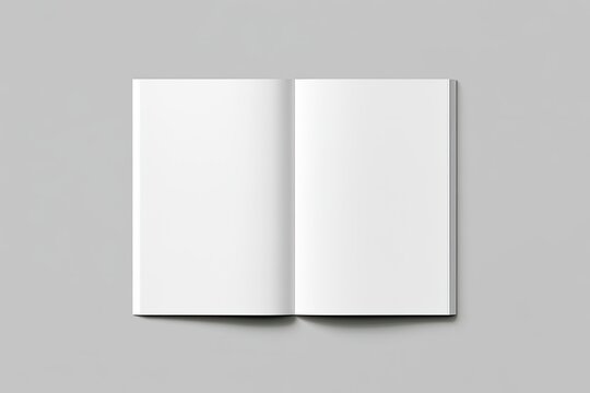 Open blank white booklet with clean pages on a neutral background