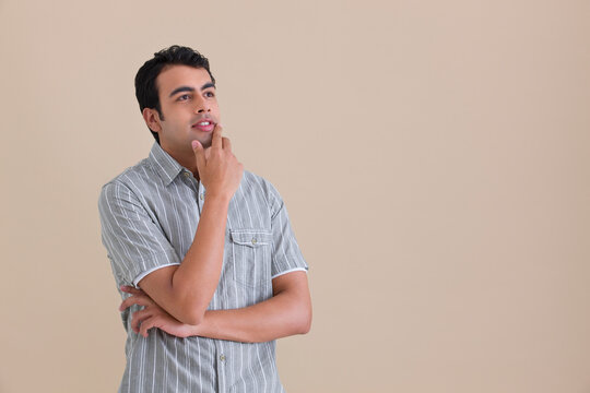 Young man thinking