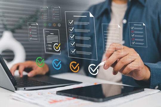 Procurement manager organizing workflow documentation including contracts, purchase orders, bids and compliance records to track costs and improve efficiency in B2B purchase management.