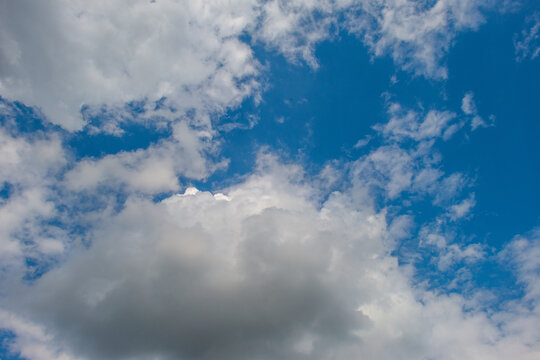 Clouds in a blue sky in bright sunlight in summer, Voeren, Limburg, Belgium, August, 2026