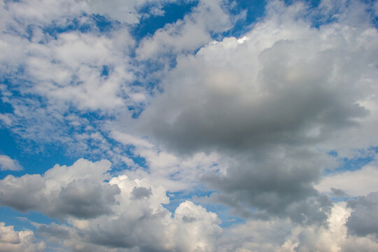 Clouds in a blue sky in bright sunlight in summer, Voeren, Limburg, Belgium, August, 2026