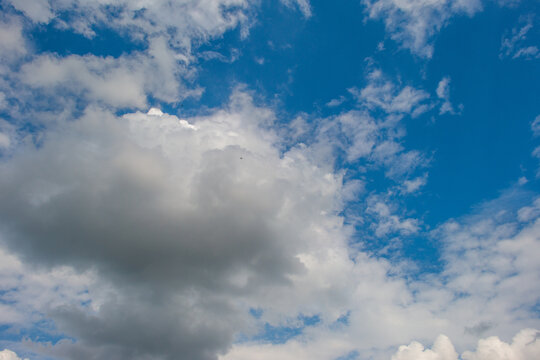 Clouds in a blue sky in bright sunlight in summer, Voeren, Limburg, Belgium, August, 2026