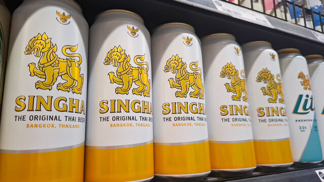 Singha Original Thai Beer Cans In Row On Supermarket Shelf Display on August 10, 2026 in Bangkok,  Thailand 

