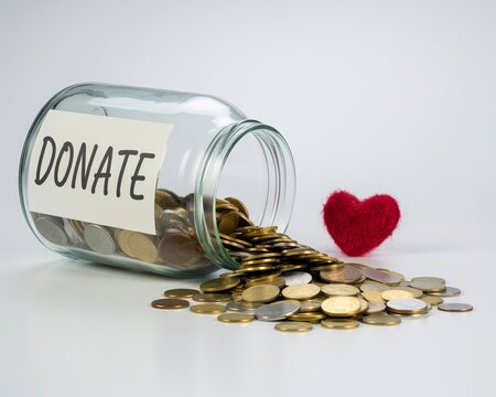 Donation Jar with Coins and Heart for Charitable Giving