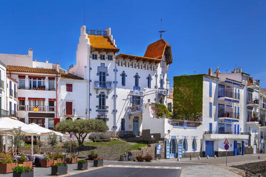 Casa Serinyana on the waterfront in Cadaques, Catalonia, Spain, facade view. Sunny daylight, Catalan Modernisme style