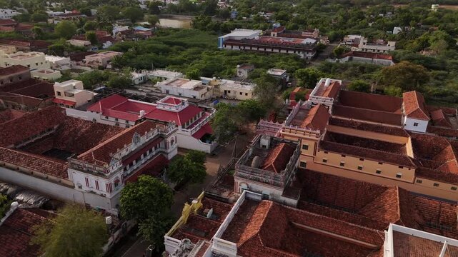 Step into the opulent past of Tamil Nadu." "Where every street corners a piece of history." "Experience the architectural grandeur of Karaikudi." "Timeless streets. Heritage homes." "The mansions