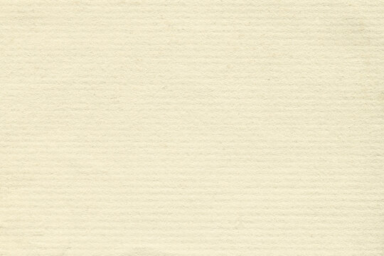 old white ribbed paper texture background. Natural corrugated surface texture for design.