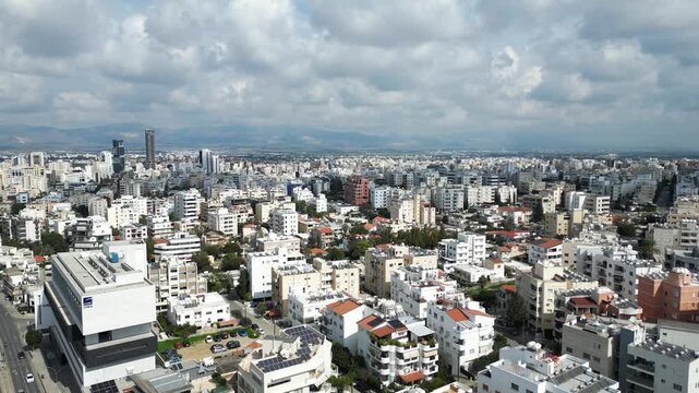 Cinematic drone footage showcasing the urban landscape and skyline of Nicosia, Cyprus