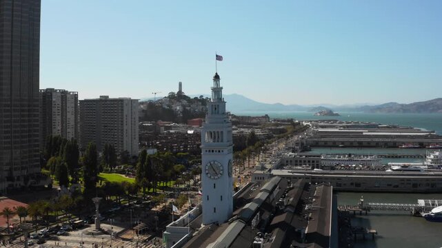 Drone Aerial Parallax of Historic Ferry Building with Coit Tower, Embarcadero, Alcatraz and Angel Island in the Background - (UHD 4K)