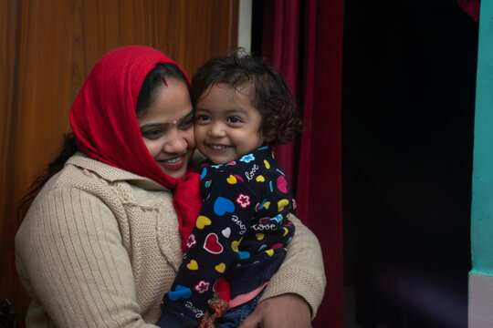 indian mother and daughter hugging each other,India