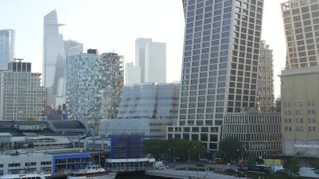 New York City Hudson yards and Chelsea urban view from Little Island pier park, Midtown of Manhattan, United States. Waterfront building architecture, skyline cityscape in USA, NYC west side district.