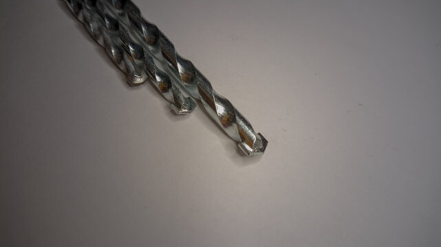 Several masonry drill bits featuring carbide tips