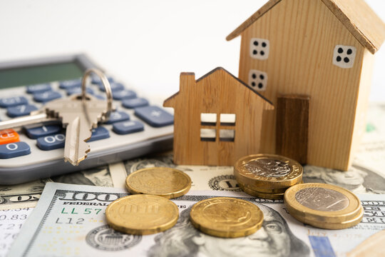House on stack coins, mortgage home loan insurance finance.