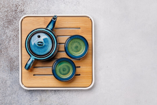 Asian tea ceremony set with teapot and cups