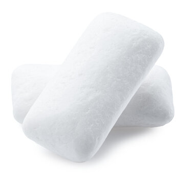 Pair of white mint chewing gum pads for oral hygiene and fresh breath care, with clipping path.