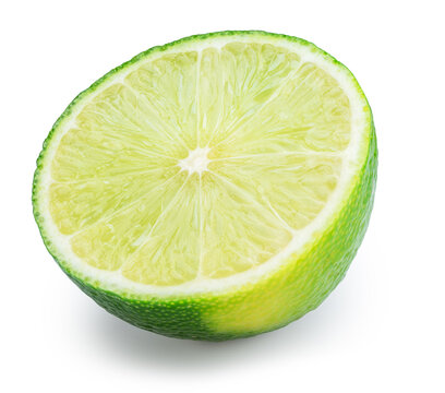 Green lime cut exactly in half isolated on a white background. Clipping Path.