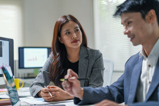 Business Colleagues Discussing Strategy in Office Meeting