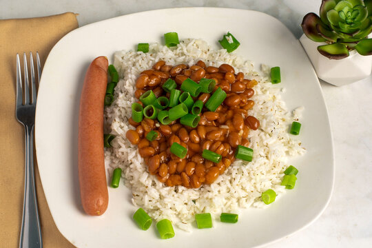 white rice with  baked beans and scallions