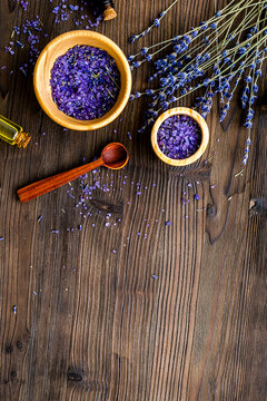 organic cosmetics with lavender on wooden background top view