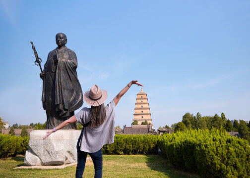 Statue of famous Monk Xuanzang of Tang Dynasty in the park in front of Histrotic Giant Wild Goose Pagoda, Xi'an, Shaanxi, China
