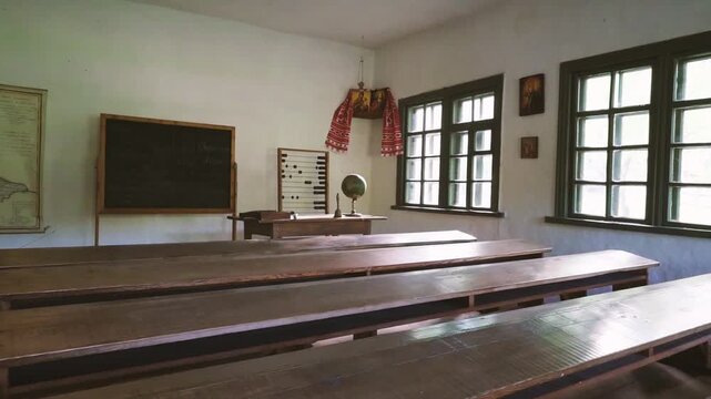 Vintage 19th Century Ukrainian Classroom Interior with Wooden Benches and Blackboard