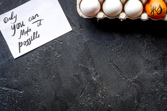 concept of correct choice eggs on dark background top view