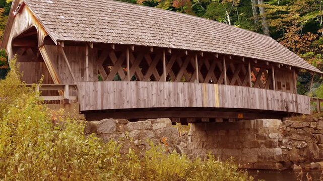 A covered bridge in New Hampshire  and pumpkins  , New England, USA	