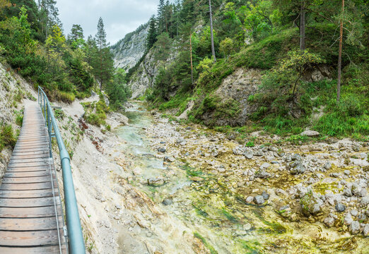Top down panoramic view of crystal clear turquoise river flowing through Otschergraben (Oetschergraeben) canyon in september, Austria