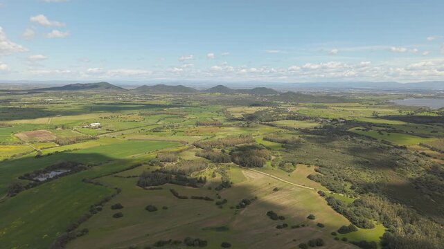 Rural Fields Viewed From The Hill Of Castello di Acquafredda Near Siliqua In Southern Sardinia, Italy. Aerial Wide Shot