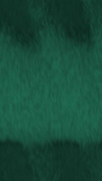 Emerald green velvet fabric background with soft pile sheen, hand-brushed nap wave, seamless vertical loop
