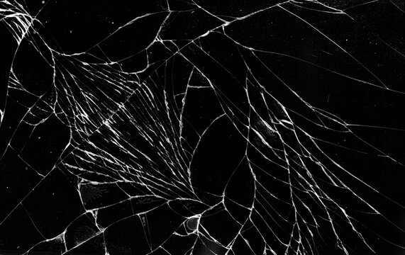 Cracked glass screen texture on black background overlay effect