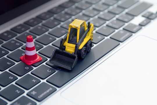 warning under construction , website under maintenance , troubleshooting and fixing