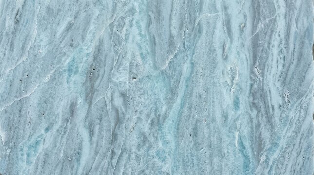 Light blue marble slab with white veining and grey streaks, natural stone texture background