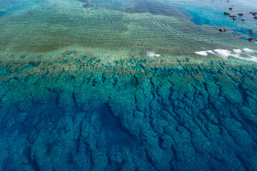 Aerial View of Imgya Reef Edge with Waves Breaking © YUTAKA