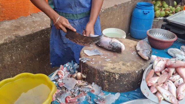 Fresh fish cutting on a large wooden chopping block at a bustling local fish market, showcasing traditional preparation, freshness, and skilled craftsmanship