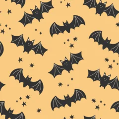 Halloween seamless pattern. Cute bats on a yellow background. Repeating vector print for wrapping, textile, decoration. Halloween party. Fall holiday illustration. © EltaMax99