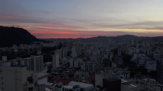 Aerial Dawn View Over Dense Modern City Skyline