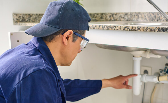 Plumber, house and handyman, inspection and maintenance with expert. Employee, contractor and repair with checklist, service or quality control with industry, at home renovation or skills