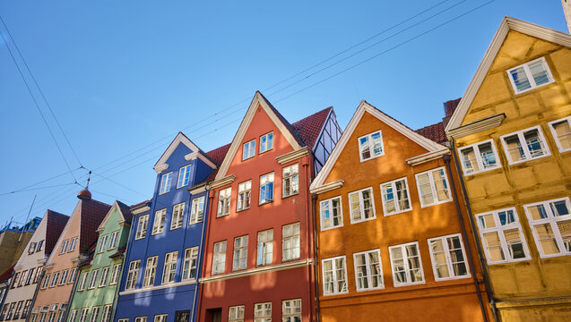Facade of traditional colorful houses in the center of Copenhagen in Denmark.