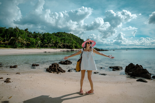 View of sea beach with woman tourist in Koh Thalu island in Prachuap Khiri Khan is a location, summer traveling for vacation