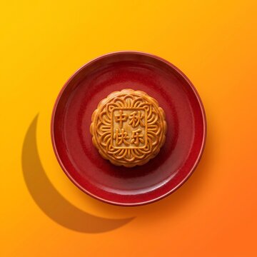 Minimalist perfect mooncake on a red plate against a vibrant yellow background