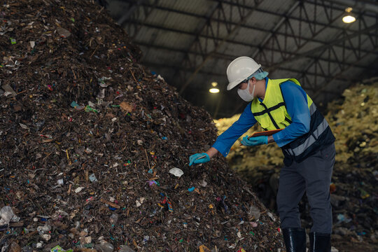 Engineers inspect waste to assess its quality and process it into renewable energy, focusing on recycling, sustainability, clean energy, and circular economy solutions.