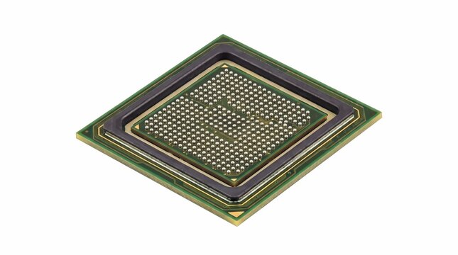 Integrated circuit processor chip featuring complex gold contact ball grid array patterns isolated against a clean solid white studio background