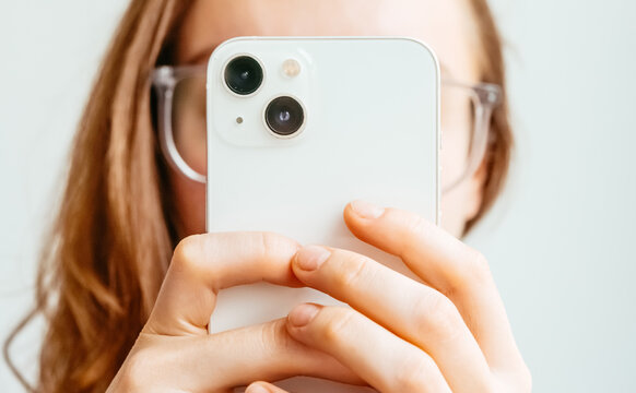 A content creator takes a mobile photo using a smartphone. Photography concept.