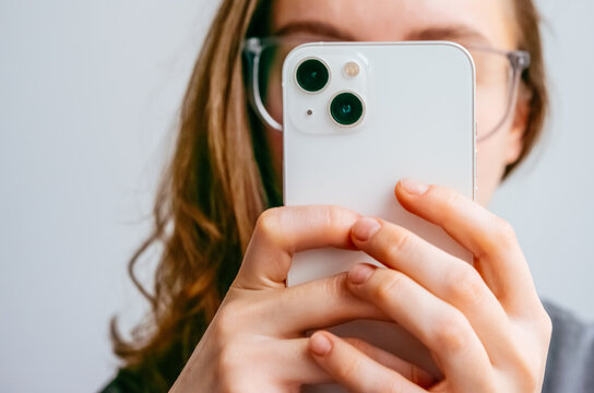 A content creator takes a mobile photo using a smartphone. Photography concept.