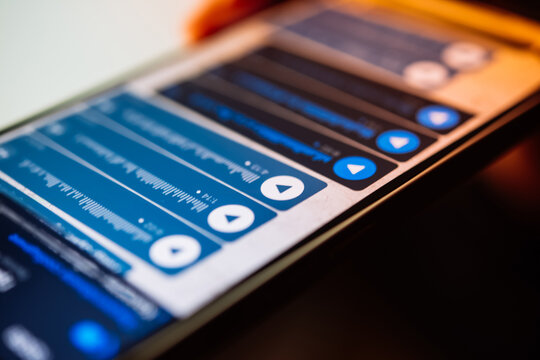 A person recording voice messages in a messenger.