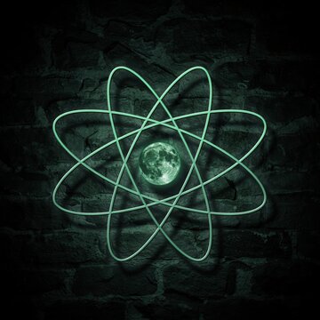 Stylized glowing green atom logo with a moon-like core against a dark brick wall background.