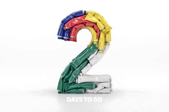 Number two made of colorful folded shirts with text days to go for countdown event