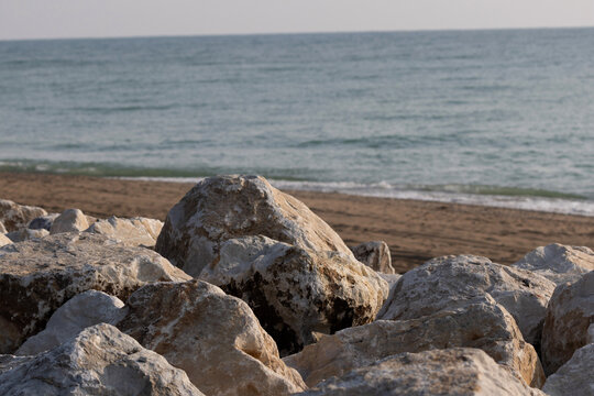 Rock Breakwater Overlooking Sandy Lake Michigan Shoreline