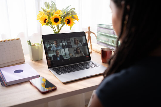 African American woman attends a video conference